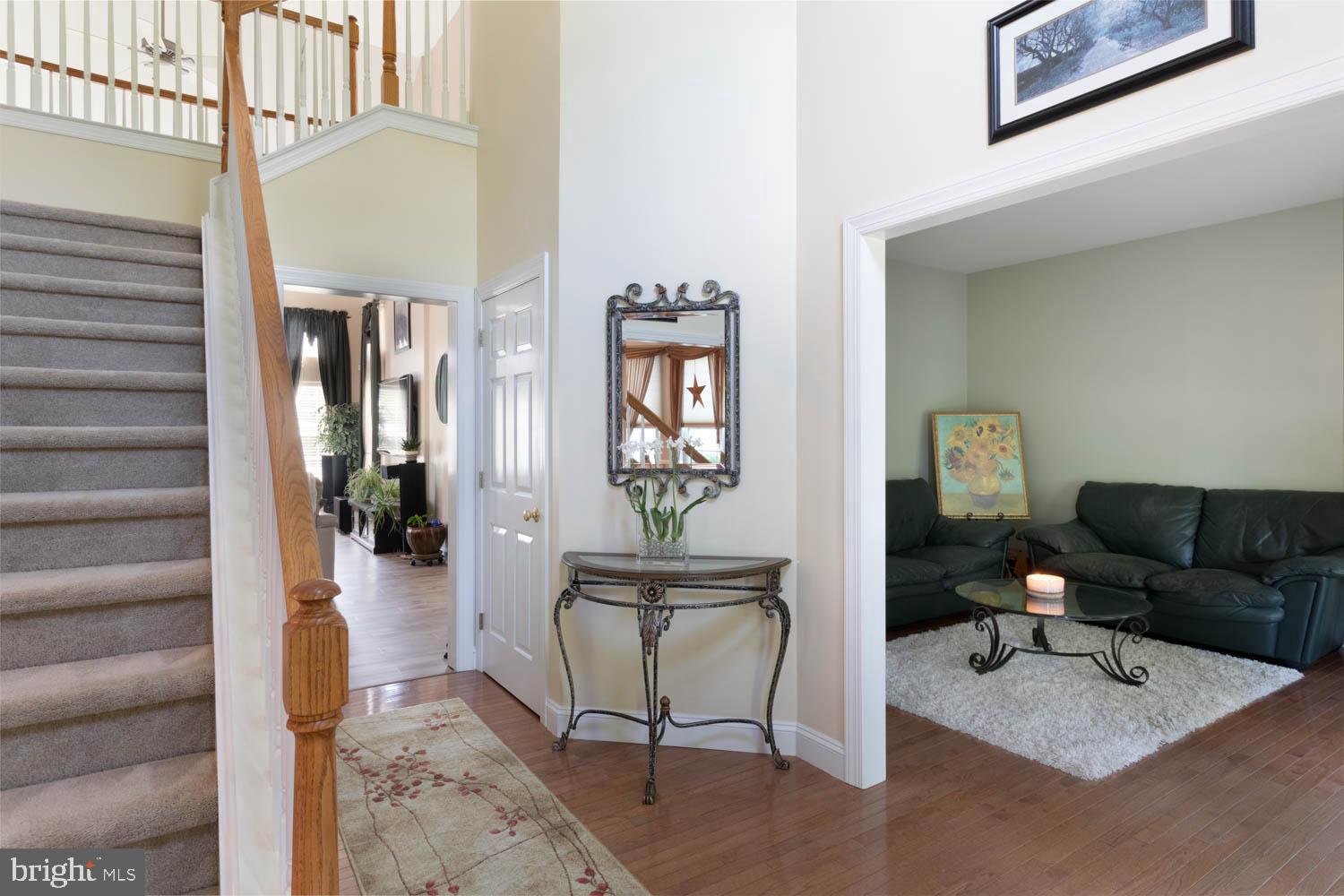 1026 Creamery Road Perkasie, PA 18944 - Photo 13 of 45 a view of a livingroom with furniture and wooden floor