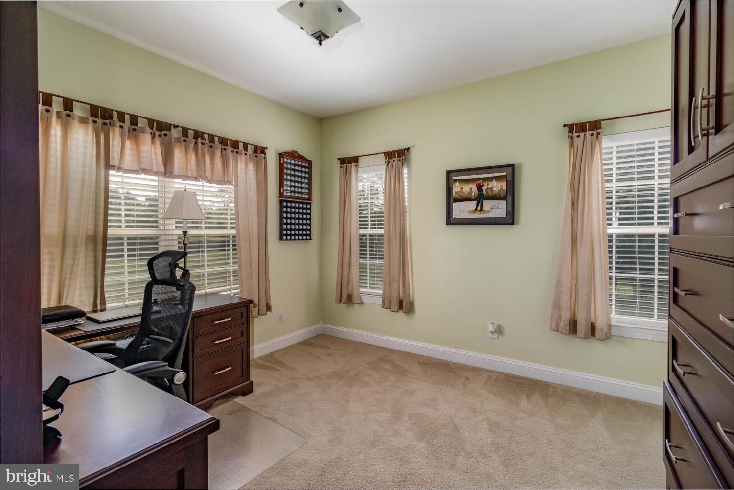 1026 Creamery Road Perkasie, PA 18944 - Photo 17 of 45 a room with furniture and large windows