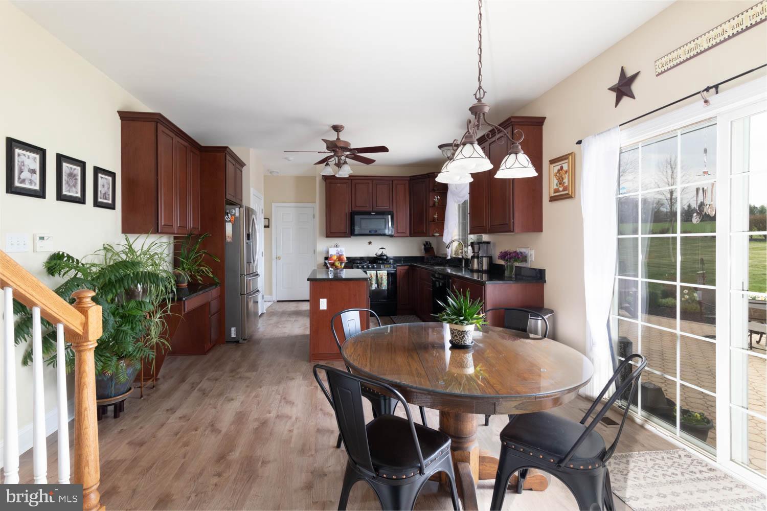 1026 Creamery Road Perkasie, PA 18944 - Photo 21 of 45 a dining room with furniture and wooden floor