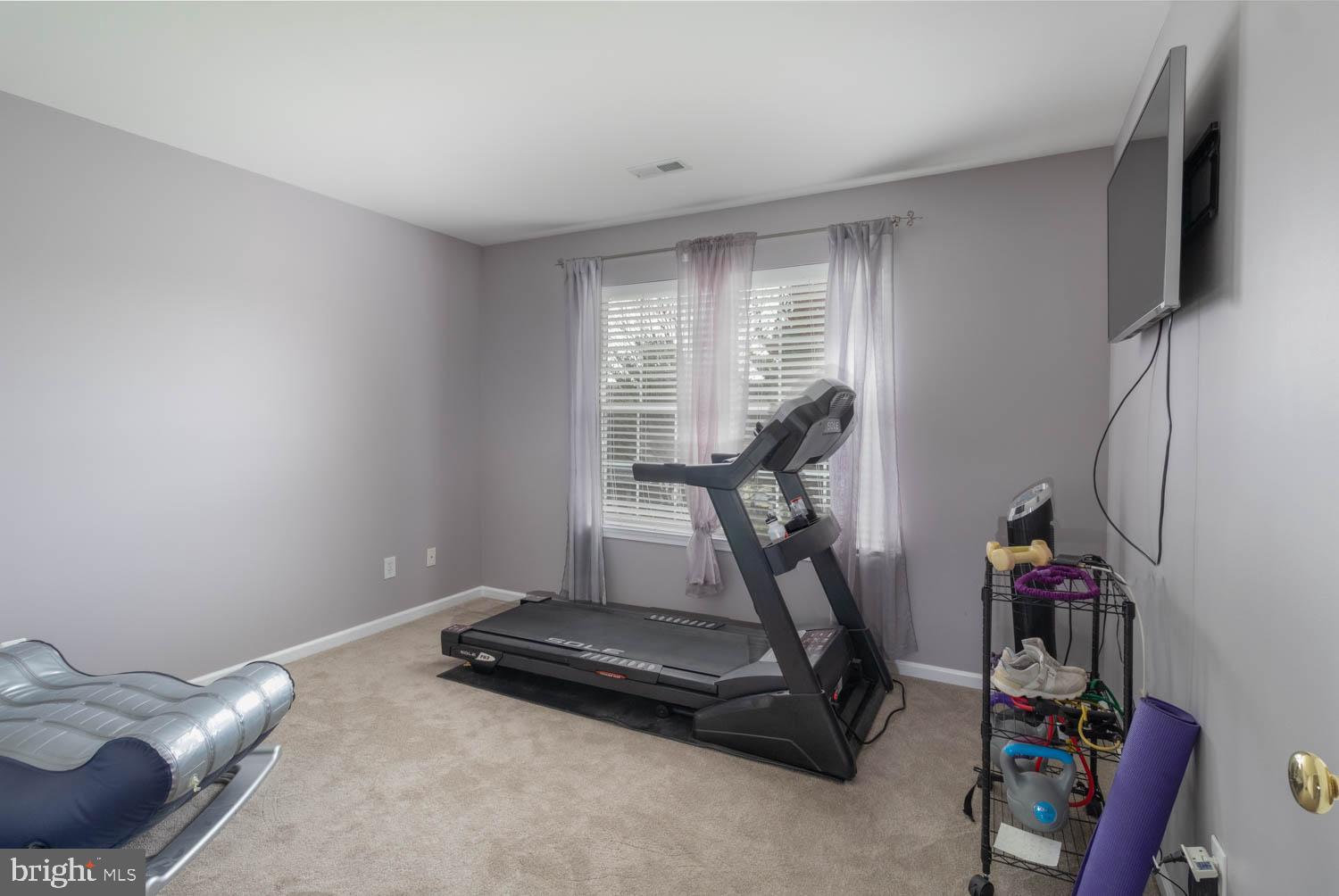 1026 Creamery Road Perkasie, PA 18944 - Photo 30 of 45 a view of a room with gym equipment