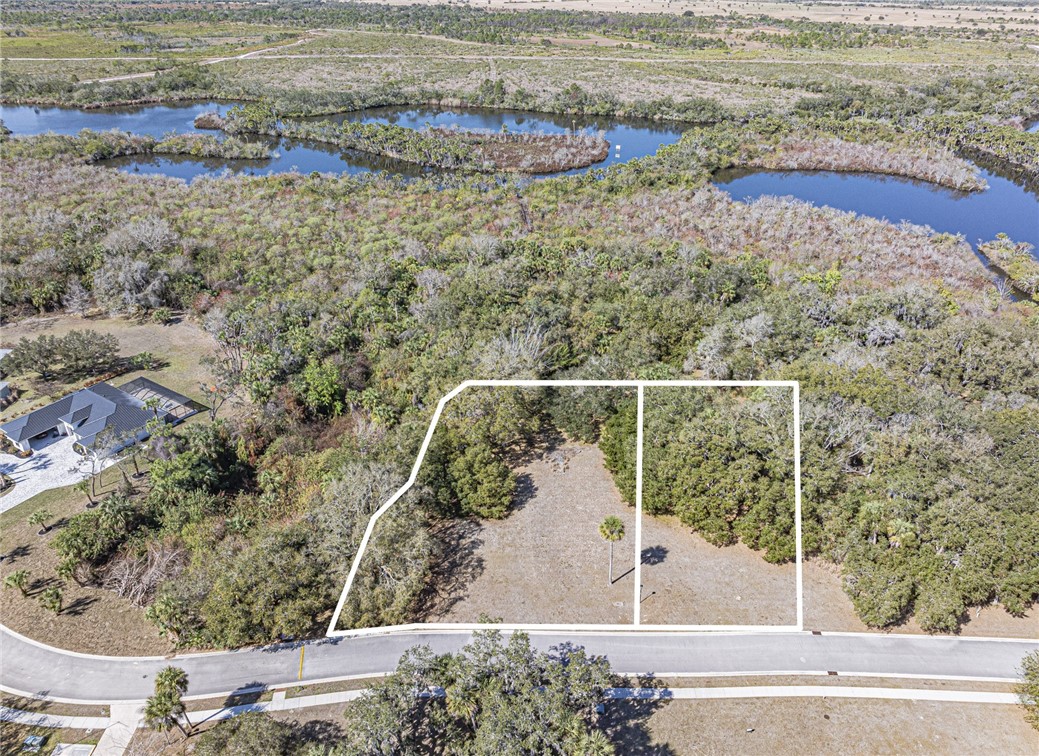 11311 Ganesh Way Sebastian, FL 32958 - Photo 1 of 28 a view of a water with a mountain view
