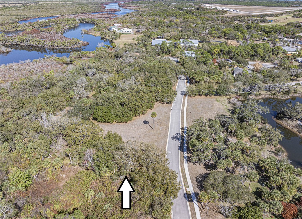 11311 Ganesh Way Sebastian, FL 32958 - Photo 6 of 28 a view of a yard with green space