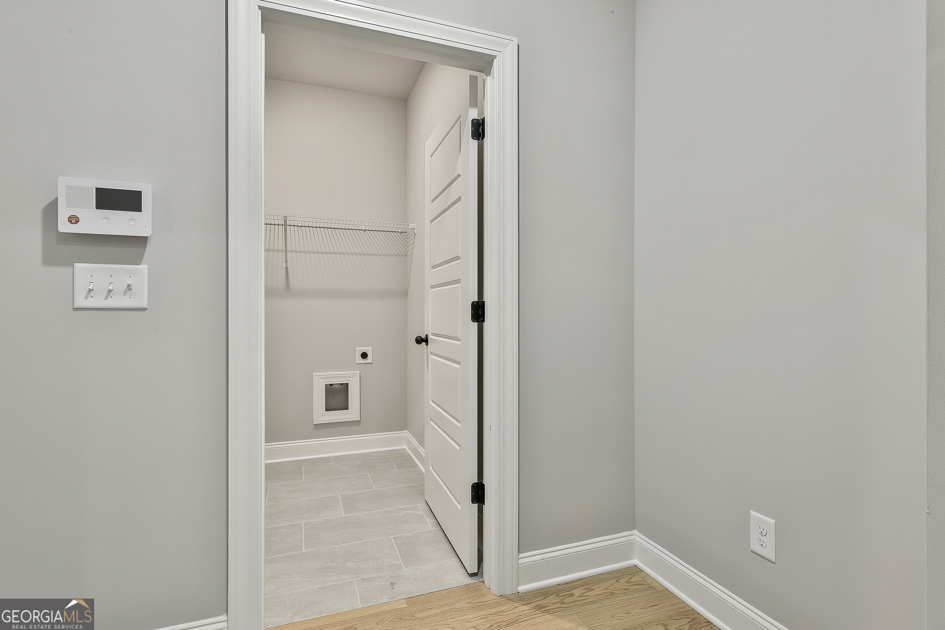 152 Wet Wood Drive, Unit 10 Fairburn, GA 30213 - Photo 25 of 39 a view of a bathroom with a glass door