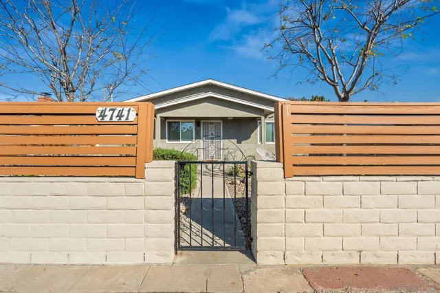 a front view of a house with patio
