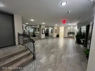 a view of a hallway with workspace