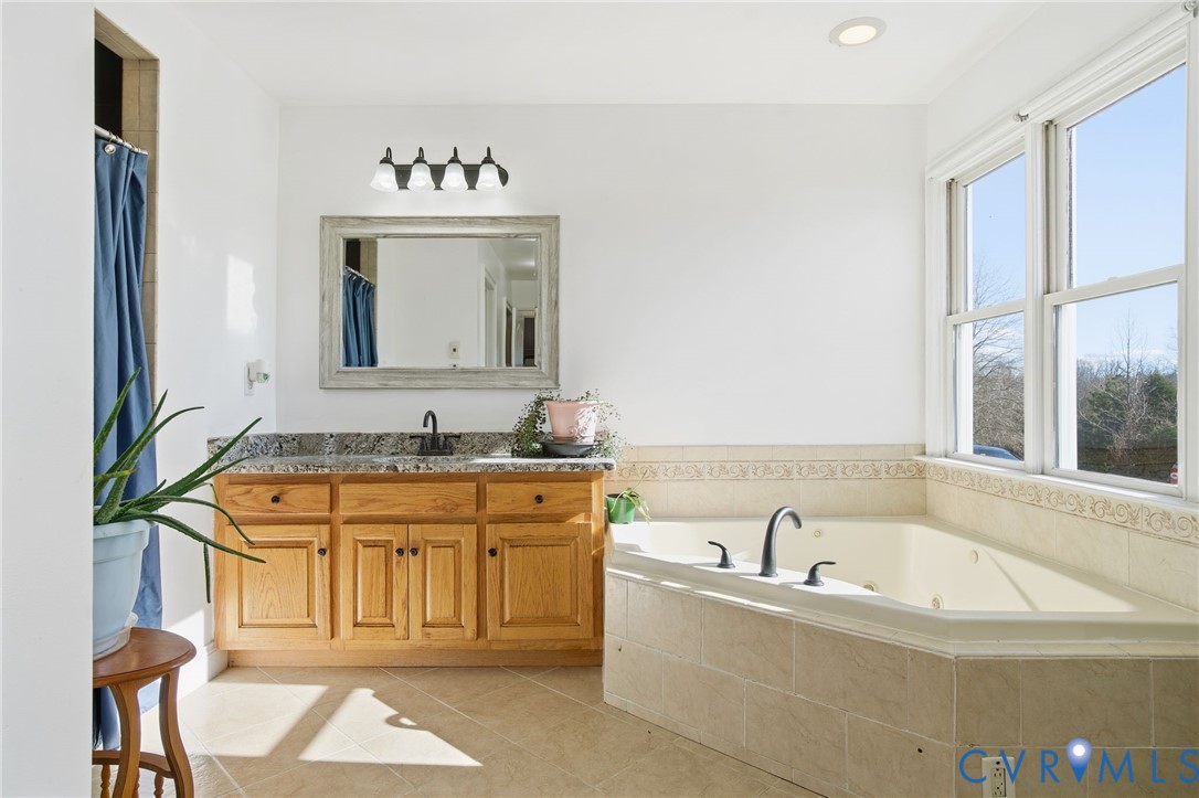 174 Mottley Mill Road Cumberland, VA 23040 - Photo 20 of 50 The primary bath has heated floors, walk-in tiled