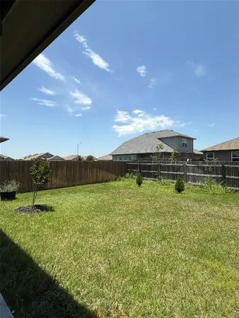 a view of an outdoor space and a yard