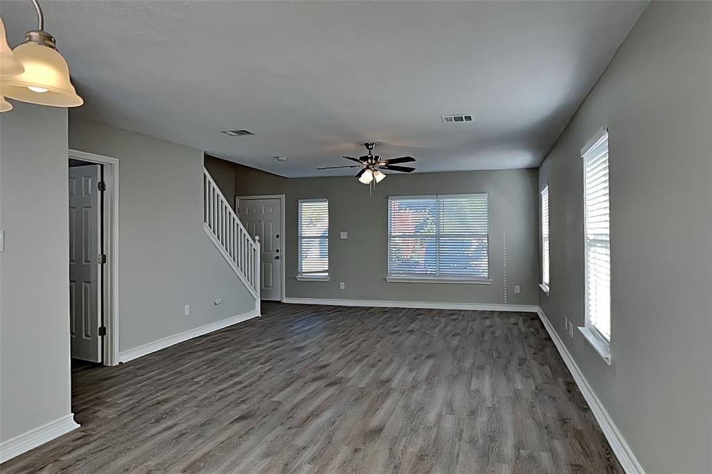 4224 Birch Creek Road Fort Worth, TX 76244 - Photo 2 of 19 wooden floor in an empty room with a window