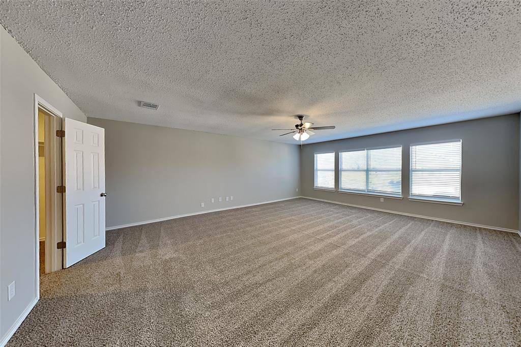 4224 Birch Creek Road Fort Worth, TX 76244 - Photo 8 of 19 wooden floor in an empty room with a window