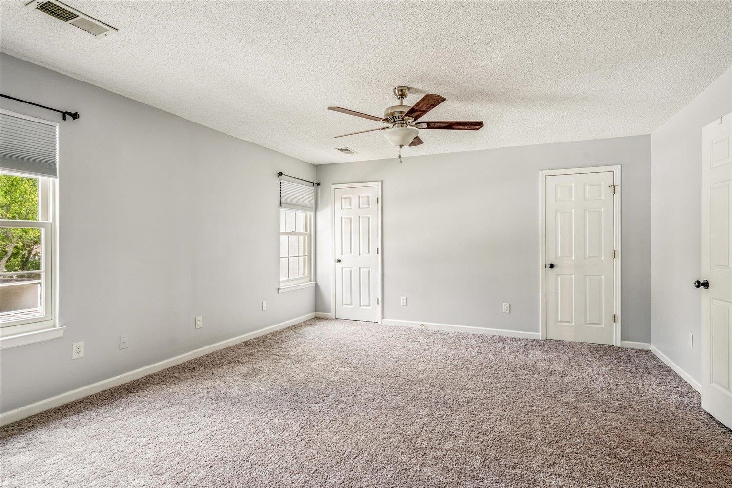7503 Bavarian Drive, Unit 19 Germantown, TN 38138 - Photo 21 of 36 a view of room with a ceiling fan and hardwood floor