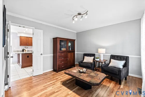 a kitchen with stainless steel appliances granite countertop a sink stove and microwave