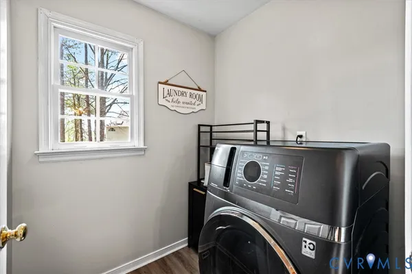 a bedroom with a bed and a chair