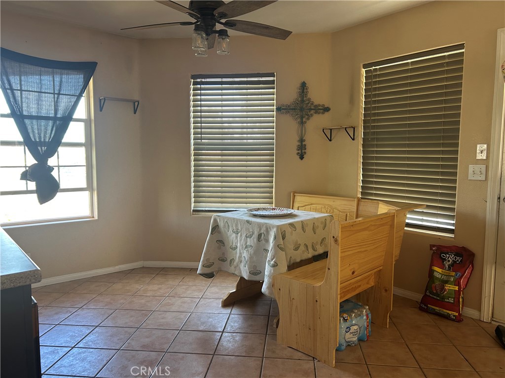 1301 West Willow Avenue Ridgecrest, CA 93555 - Photo 2 of 12 a spacious bathroom with a tub and window
