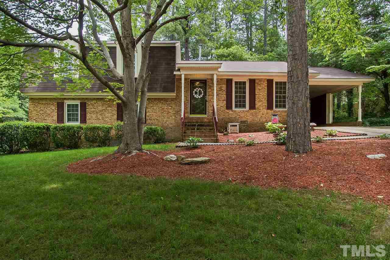 4212 Pickwick Drive Raleigh, NC 27613 - Photo 1 of 8 front view of a house with a yard