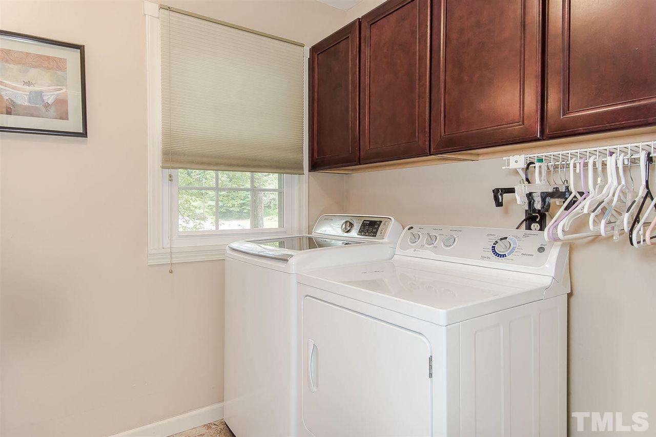 4212 Pickwick Drive Raleigh, NC 27613 - Photo 8 of 8 a view of utility room with washer and dryer