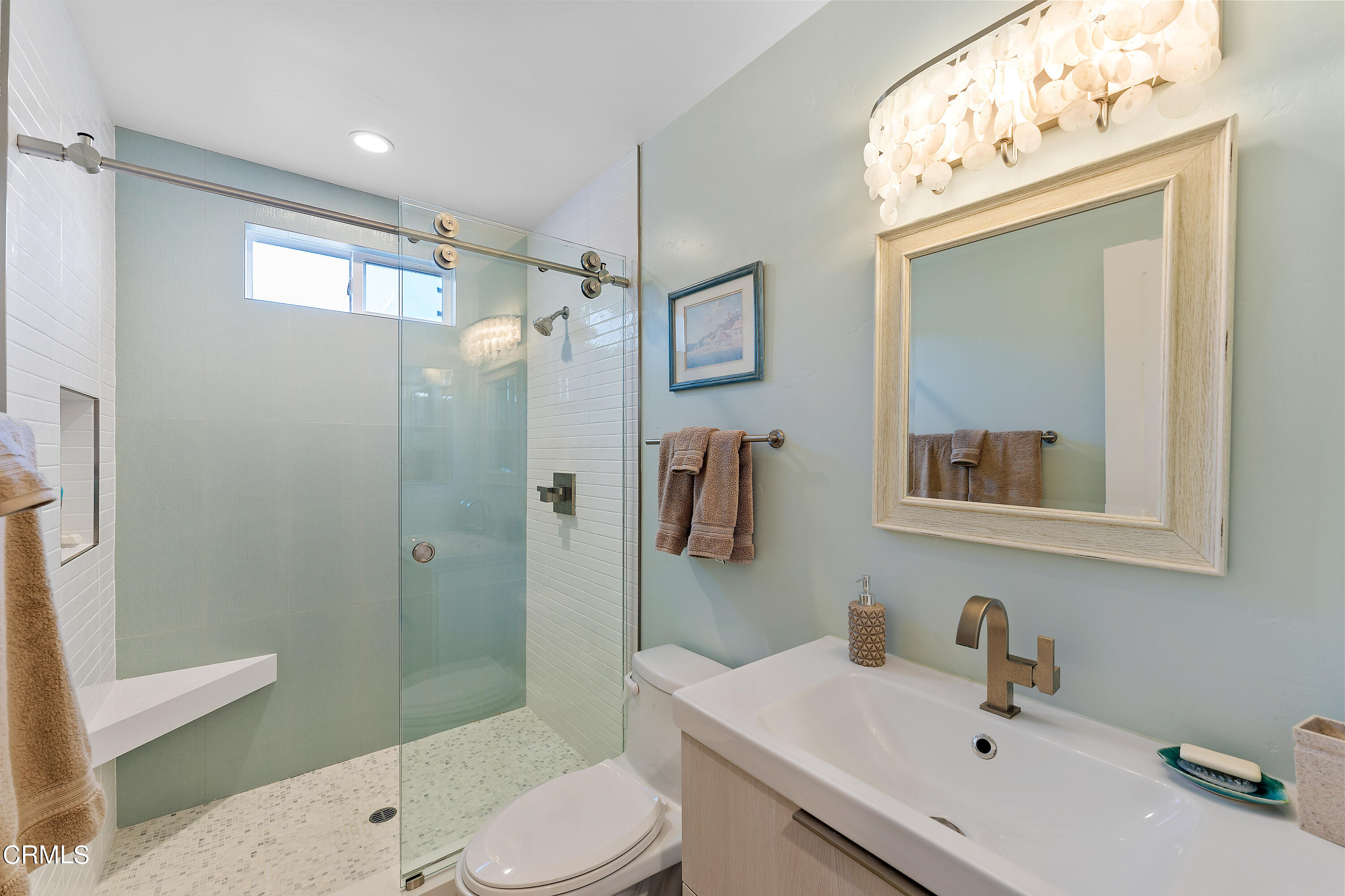 5207 Sealane Way Oxnard, CA 93035 - Photo 20 of 45 a bathroom with a sink a toilet and shower