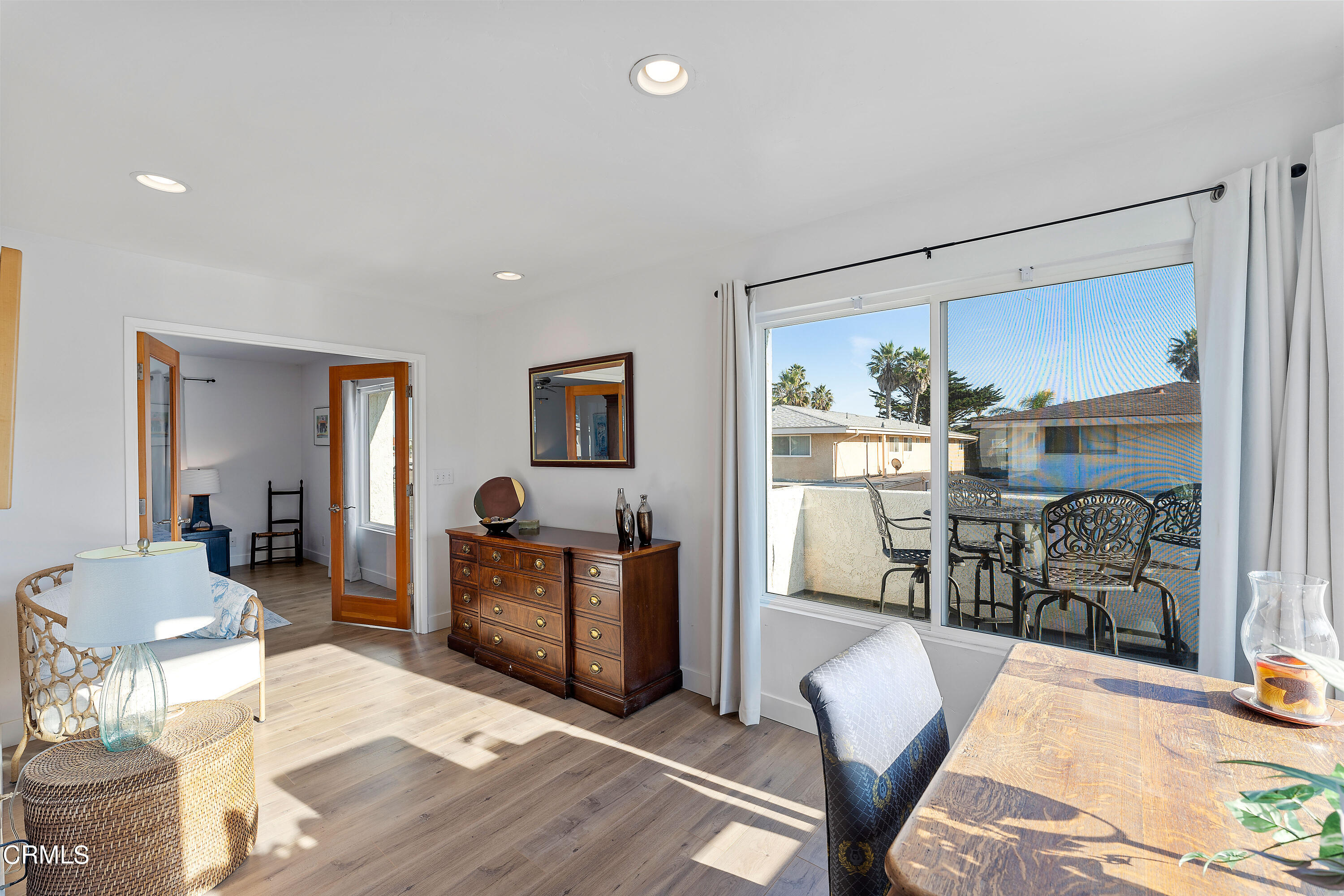 5207 Sealane Way Oxnard, CA 93035 - Photo 33 of 45 a living room with furniture and a table
