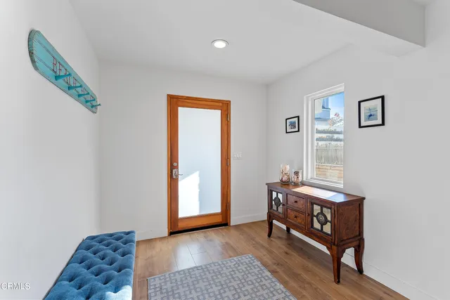 a room with furniture and a window