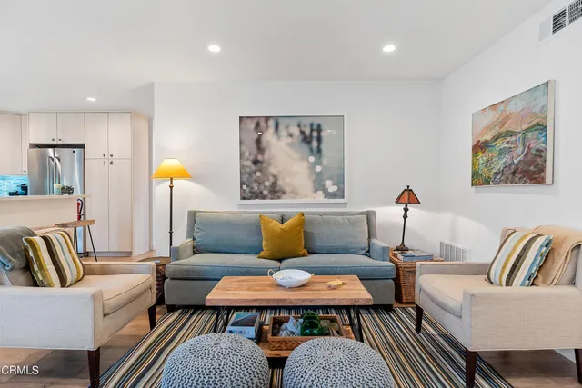 a living room with furniture and a view