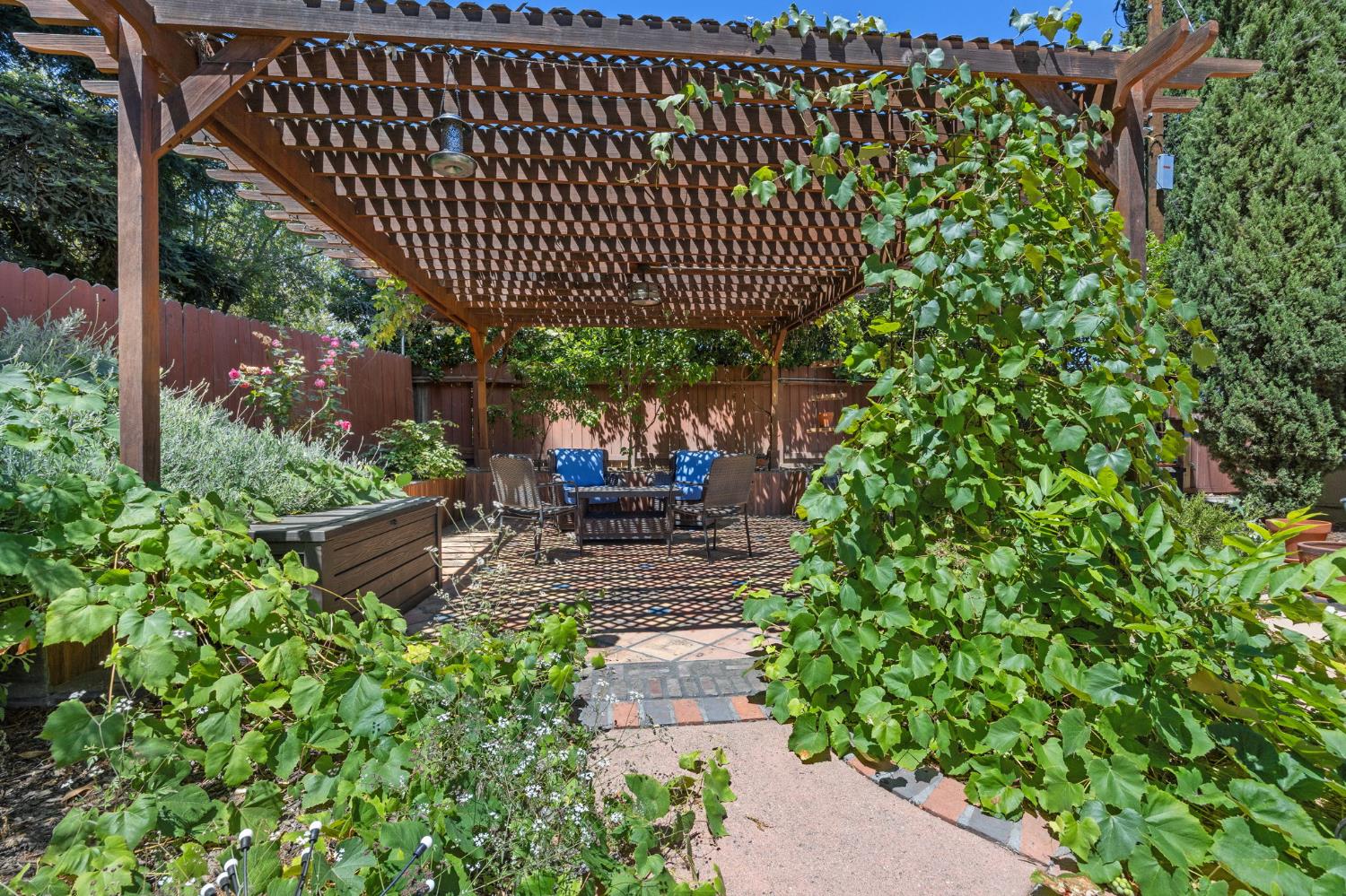 4206 Zephyr Way Sacramento, CA 95821 - Photo 36 of 45 a view of a chair and table in the garden