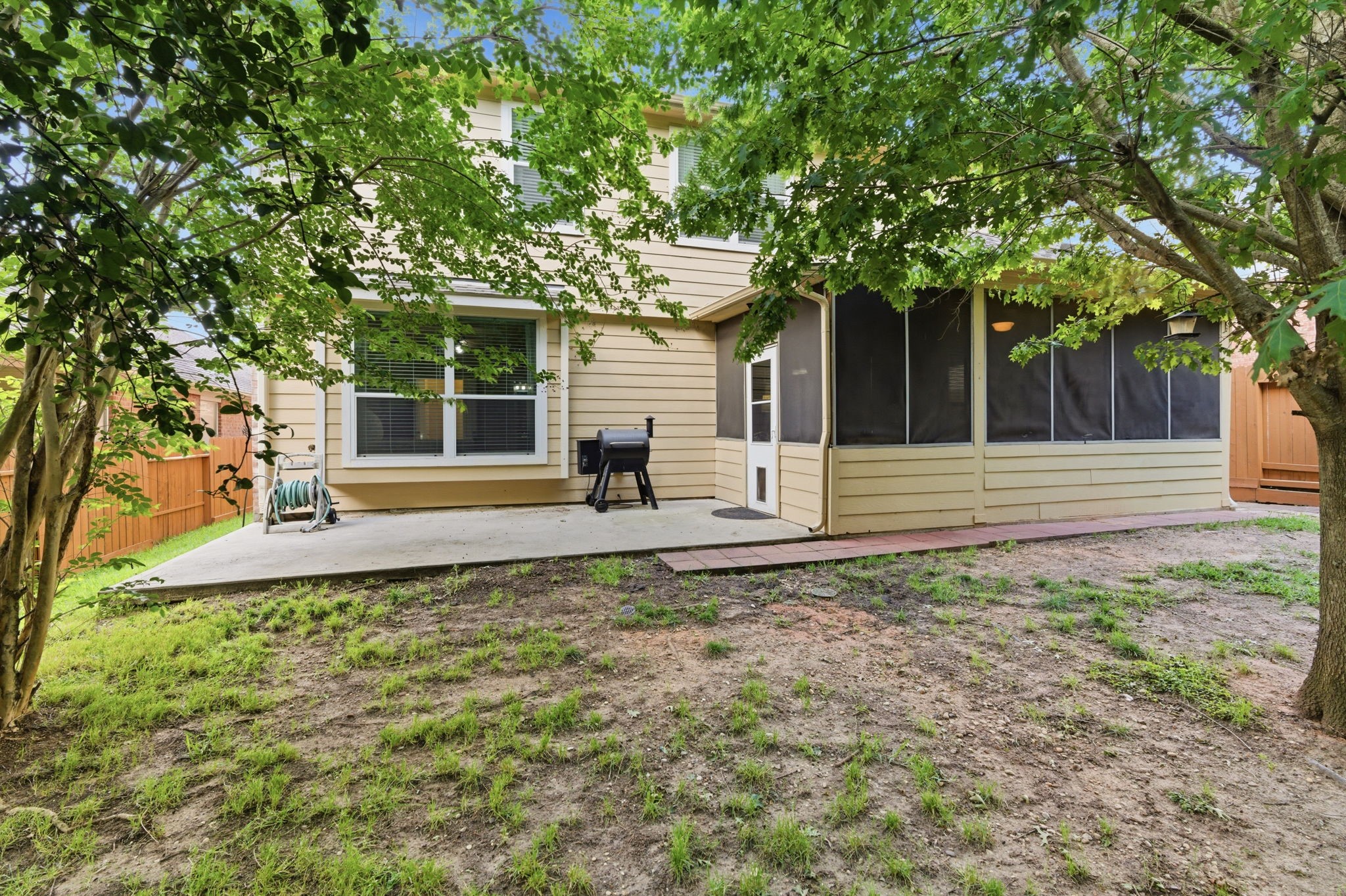 1737 Round Oak Lane Conroe, TX 77304 - Photo 35 of 39 a front view of a house with a yard