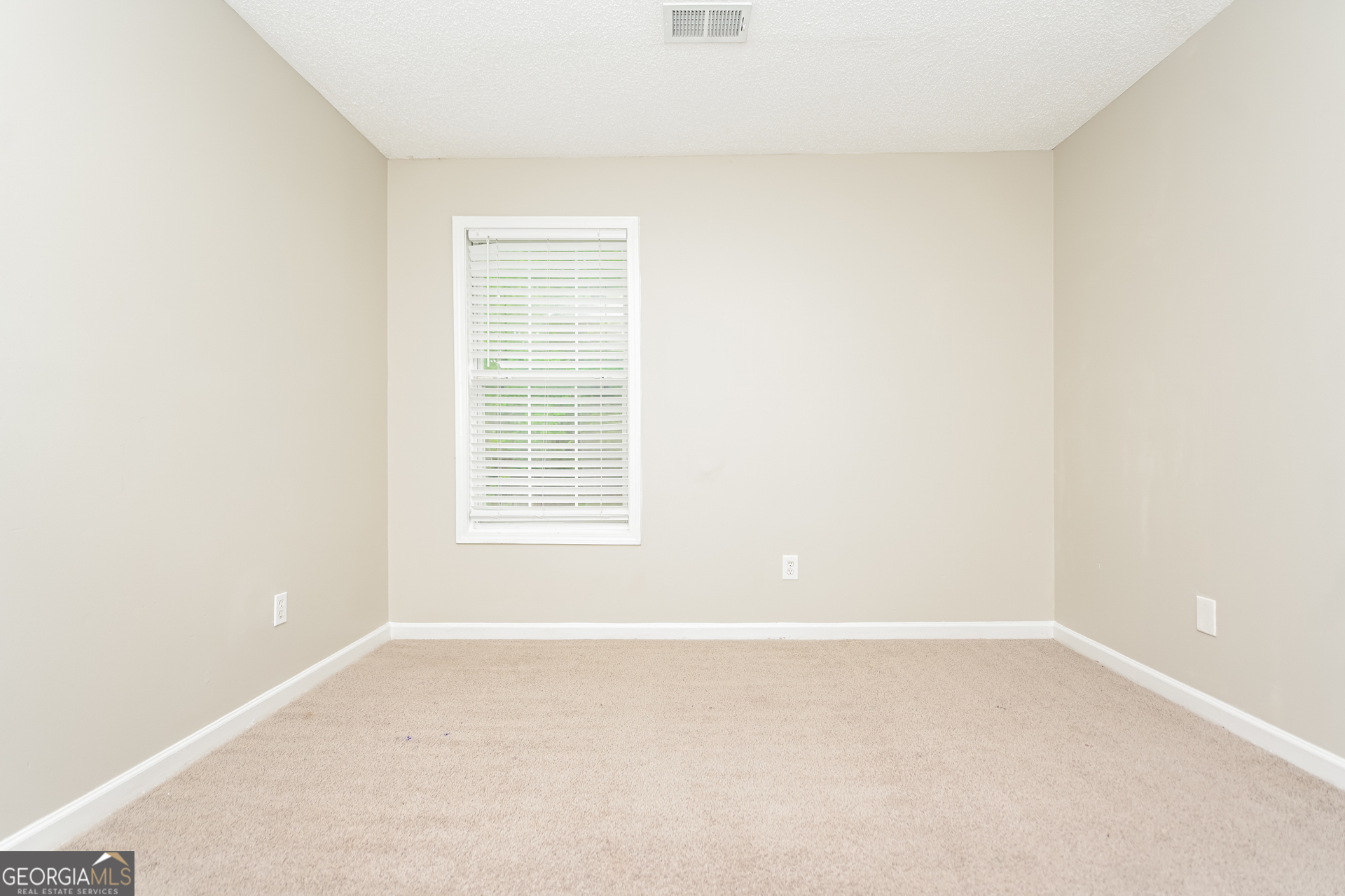 10253 Commons Crossing Jonesboro, GA 30238 - Photo 11 of 17 a view of a small space with a window