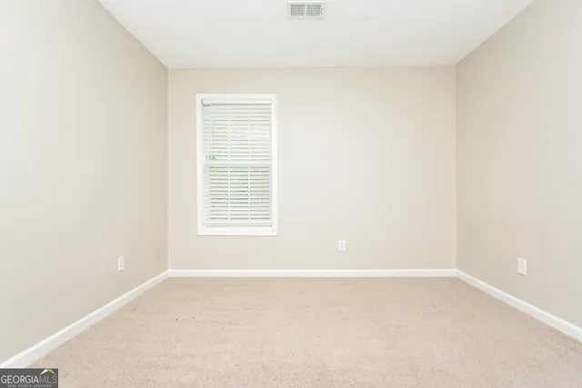 a view of a small space with a window