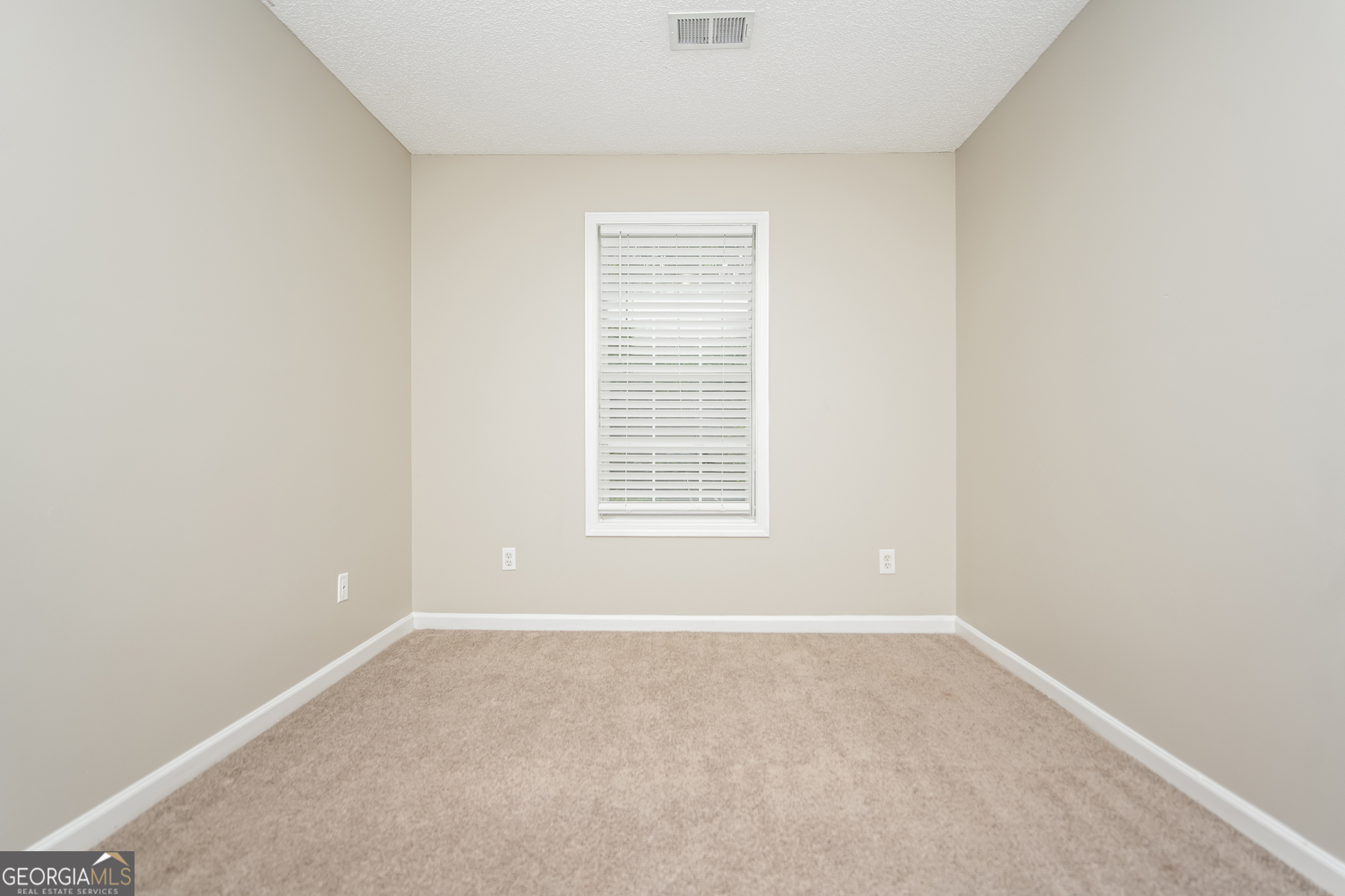 10253 Commons Crossing Jonesboro, GA 30238 - Photo 13 of 17 a view of a small space with a window