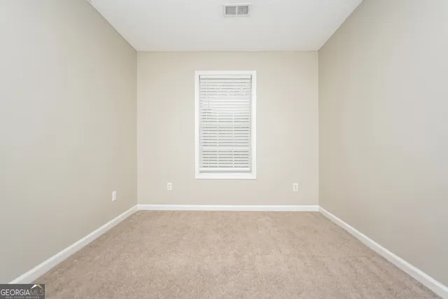 a view of a small space with a window