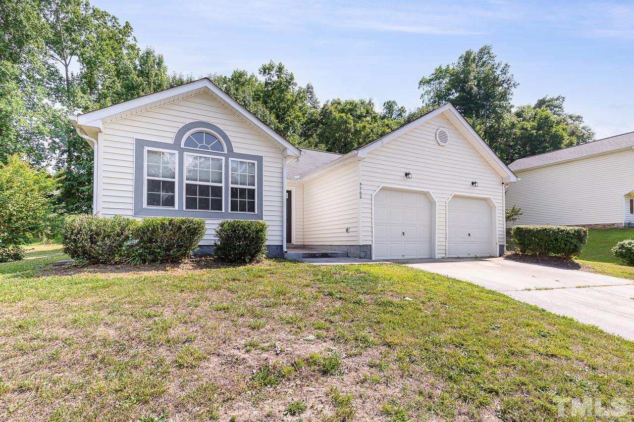 5708 Brandycrest Drive Raleigh, NC 27610 - Photo 2 of 31 a view of a back yard of the house