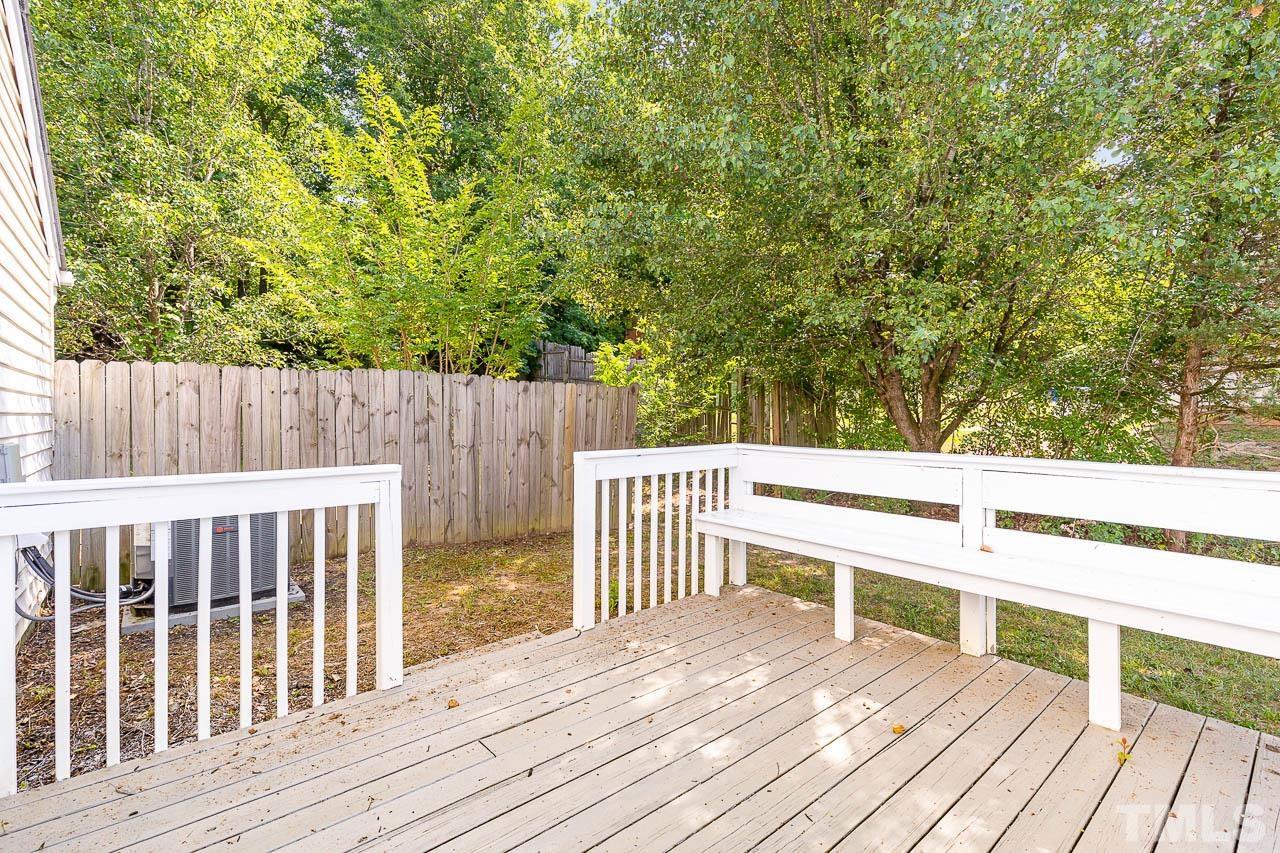 5708 Brandycrest Drive Raleigh, NC 27610 - Photo 28 of 31 a view of deck with wooden floor and fence