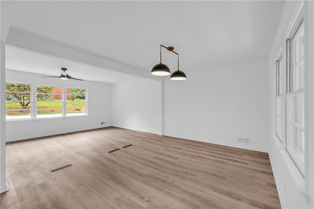2678 Rainbow Forest Drive Decatur, GA 30034 - Photo 12 of 48 a view of empty room with wooden floor and fan