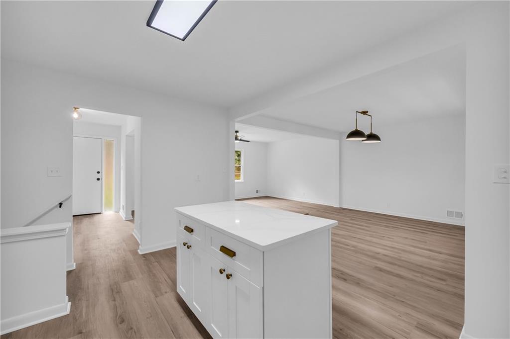 2678 Rainbow Forest Drive Decatur, GA 30034 - Photo 14 of 48 a view of a kitchen counter space with wooden floor