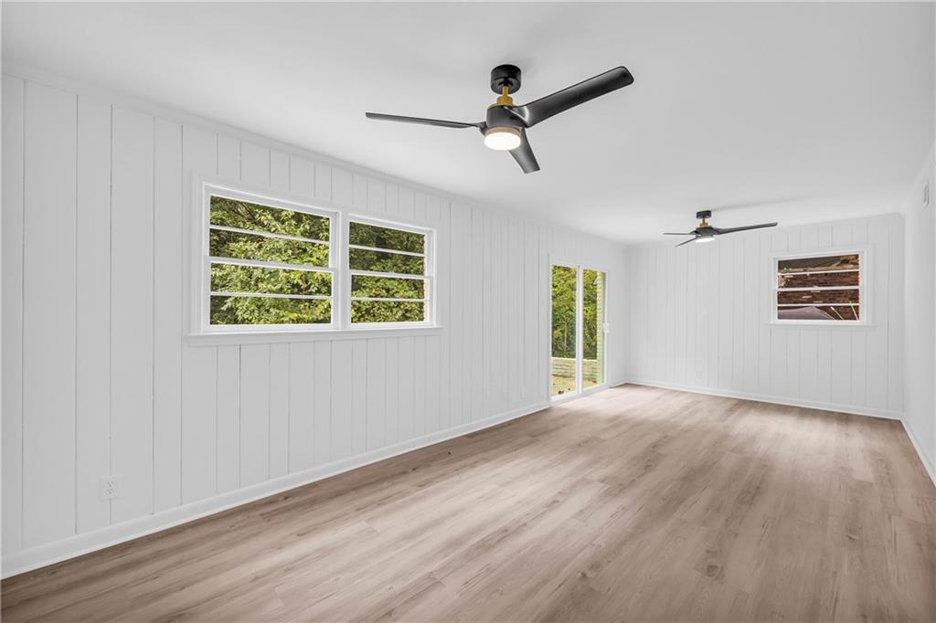 2678 Rainbow Forest Drive Decatur, GA 30034 - Photo 17 of 48 a view of empty room with wooden floor and ceiling fan