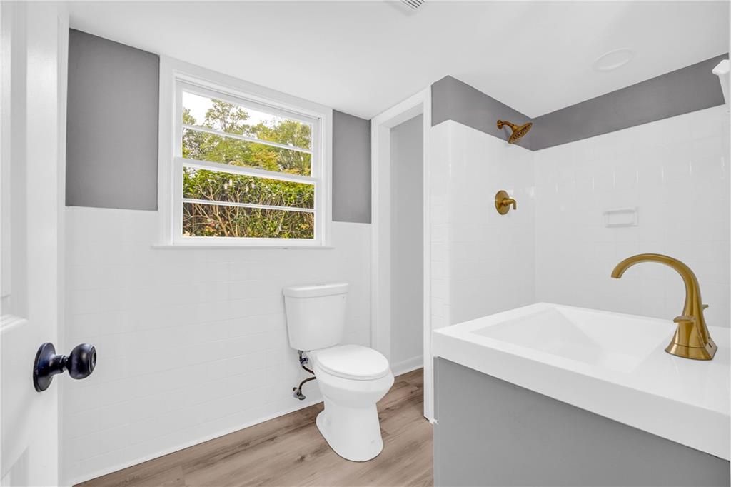 2678 Rainbow Forest Drive Decatur, GA 30034 - Photo 24 of 48 a bathroom with a sink toilet and shower