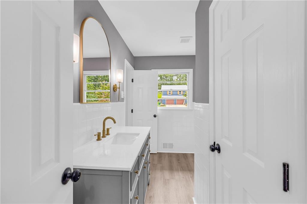 2678 Rainbow Forest Drive Decatur, GA 30034 - Photo 29 of 48 a bathroom with a sink and a mirror