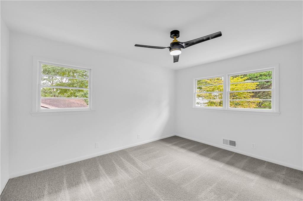 2678 Rainbow Forest Drive Decatur, GA 30034 - Photo 32 of 48 a view of an empty room with a window