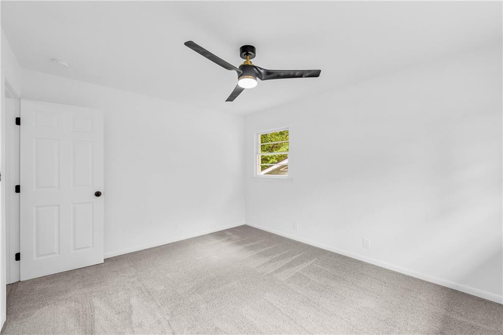 2678 Rainbow Forest Drive Decatur, GA 30034 - Photo 35 of 48 a view of a hallway with a window