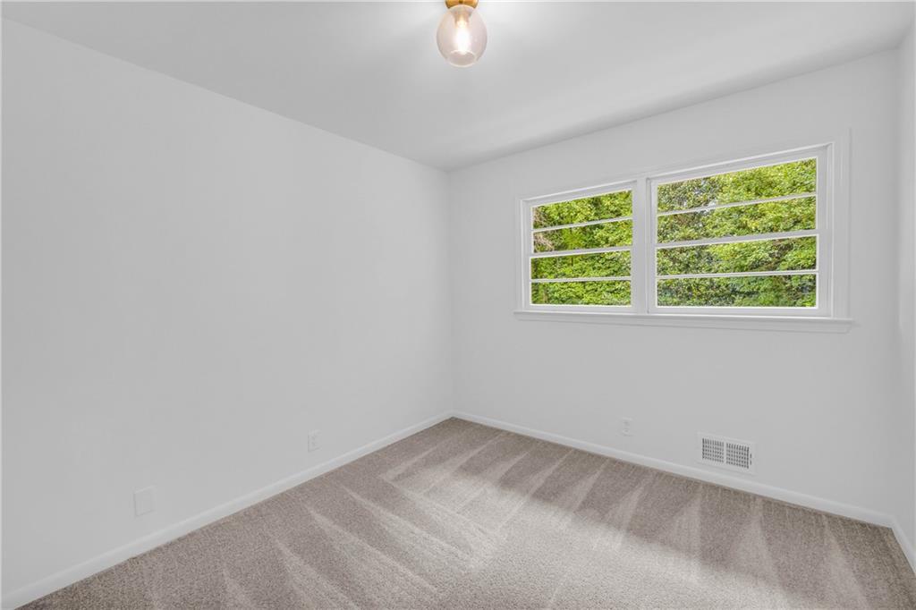 2678 Rainbow Forest Drive Decatur, GA 30034 - Photo 36 of 48 an empty room with a window
