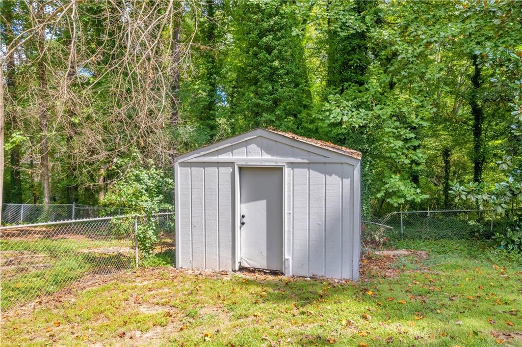 2678 Rainbow Forest Drive Decatur, GA 30034 - Photo 42 of 48 a front view of a house with garden