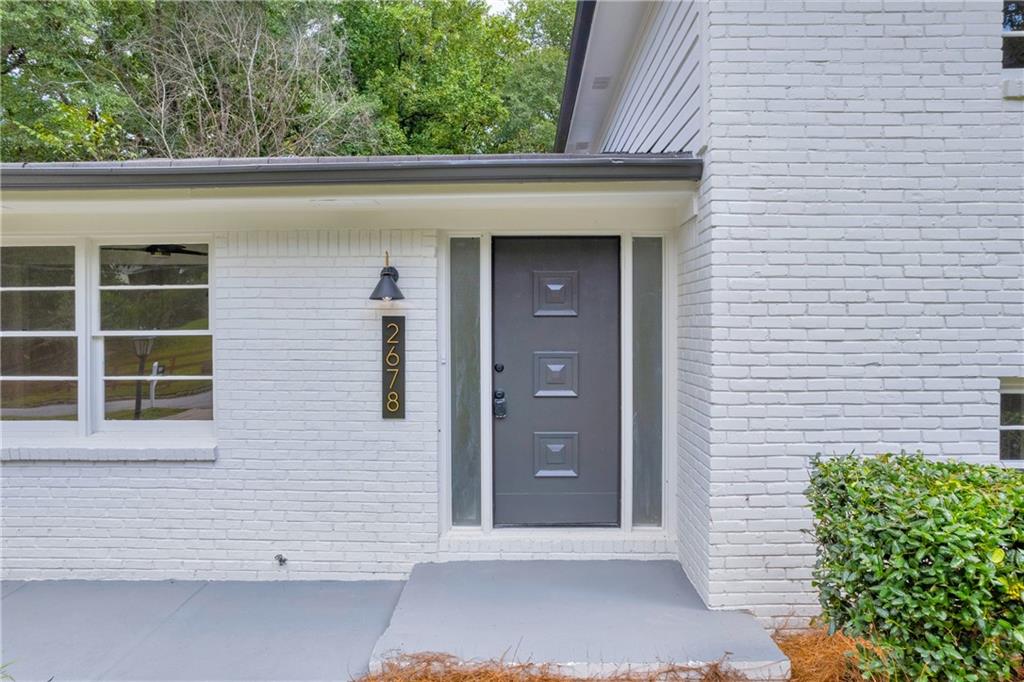 2678 Rainbow Forest Drive Decatur, GA 30034 - Photo 5 of 48 a view of front door and potted plants