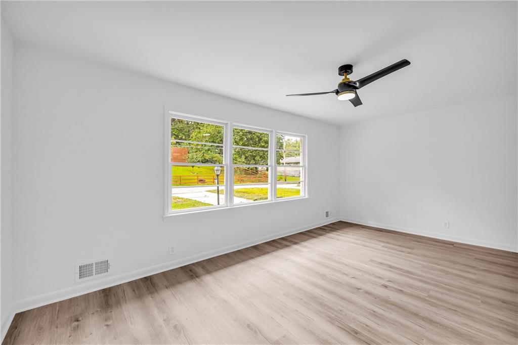 2678 Rainbow Forest Drive Decatur, GA 30034 - Photo 7 of 48 a view of an empty room with a window