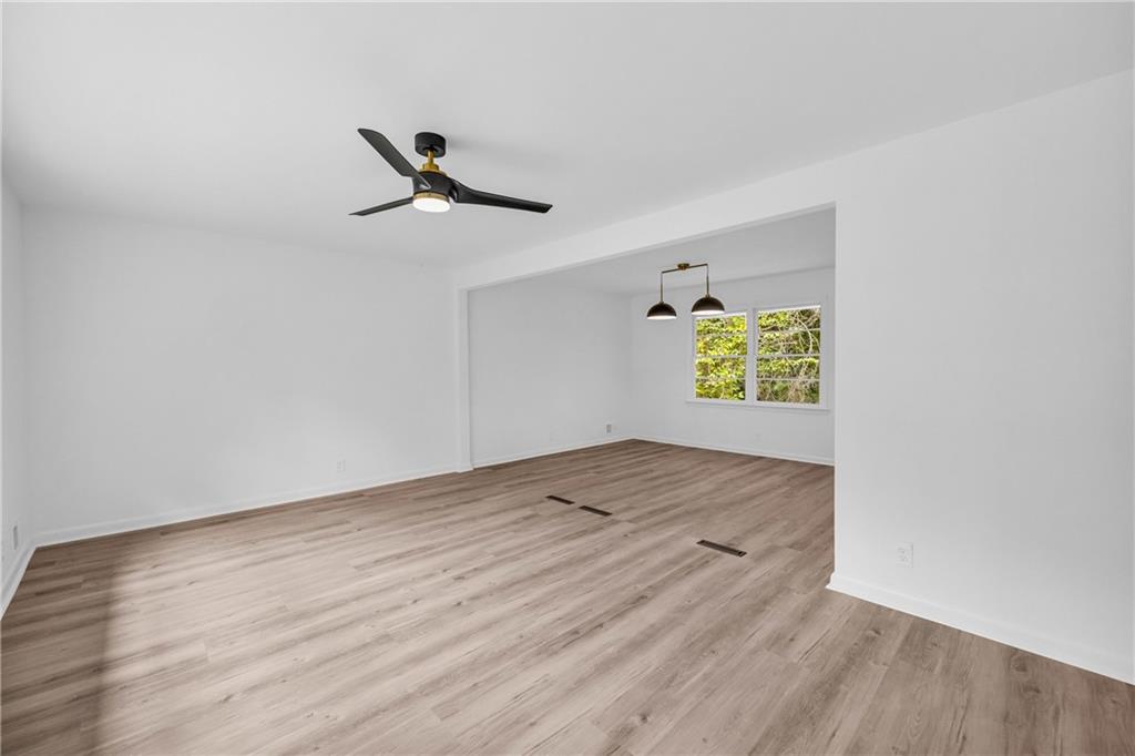 2678 Rainbow Forest Drive Decatur, GA 30034 - Photo 8 of 48 a view of empty room with wooden floor