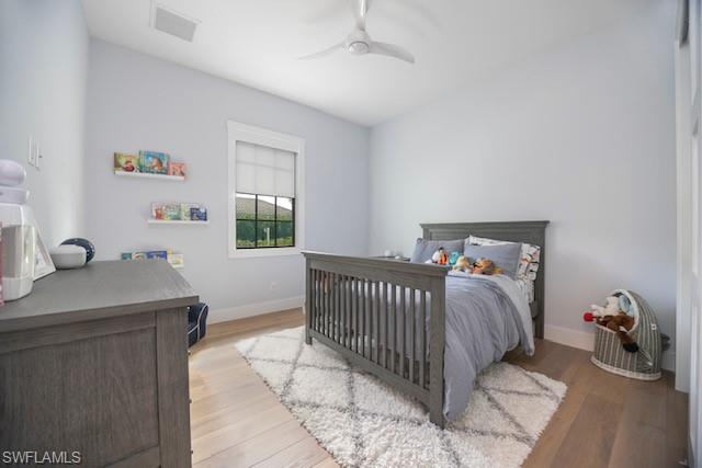 Undisclosed Address Naples, FL 34110 - Photo 10 of 18 a bedroom with a bed and a window