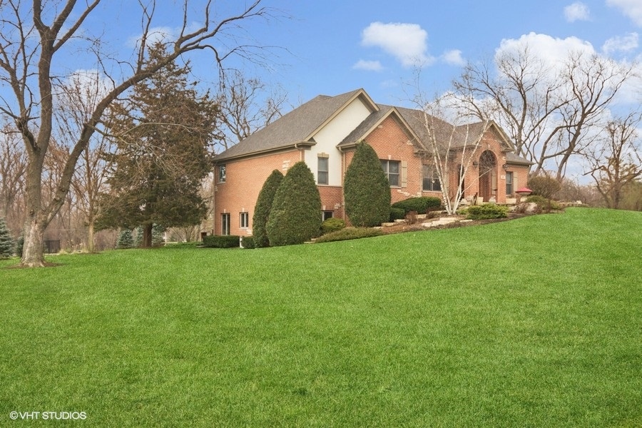 91 Roberts Road Inverness, IL 60067 - Photo 29 of 36 a view of a house with a yard
