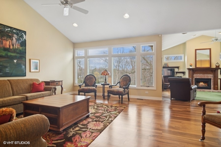 91 Roberts Road Inverness, IL 60067 - Photo 4 of 36 a living room with furniture and a large window