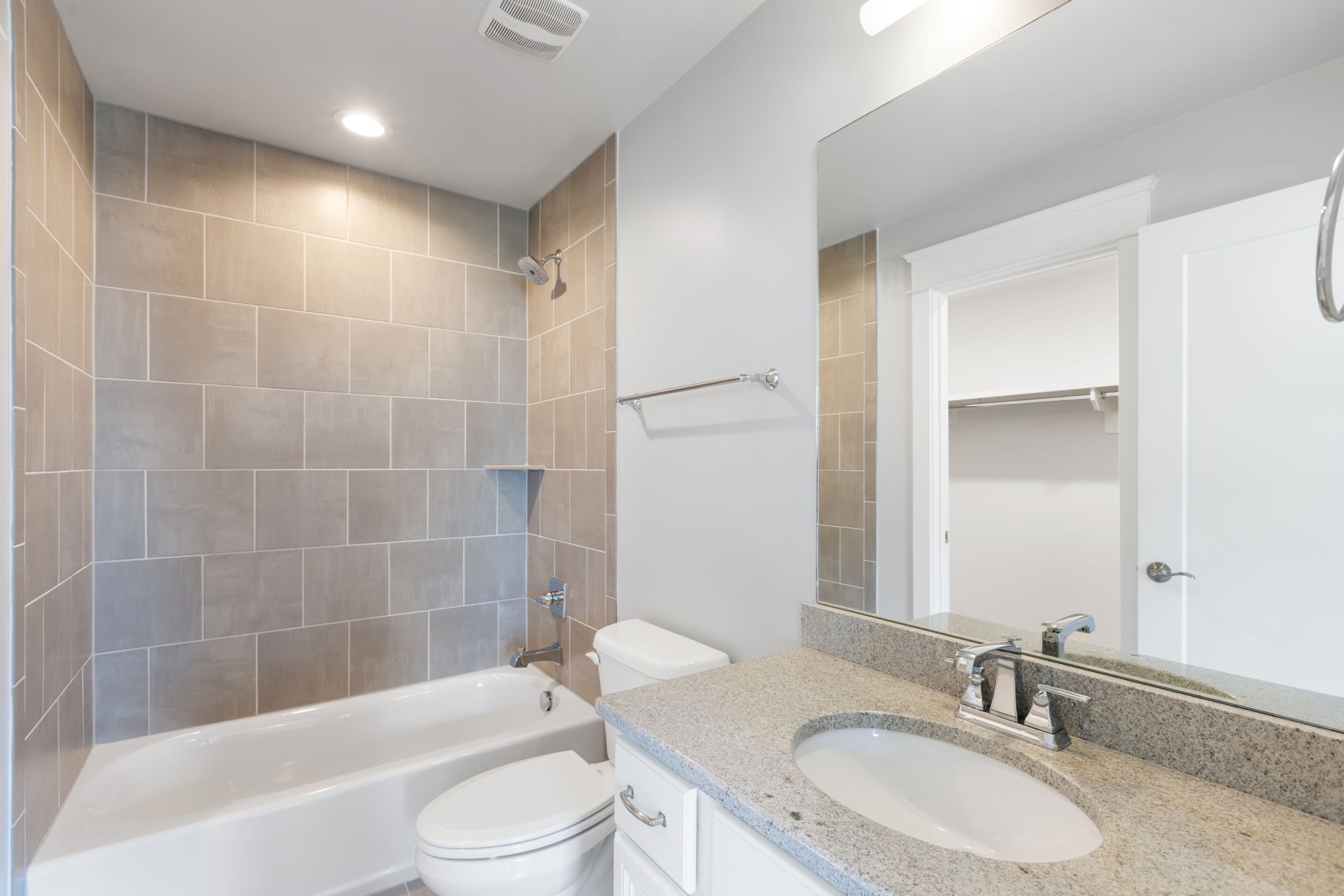 3091 Cheever Street Franklin, TN 37064 - Photo 28 of 36 a bathroom with a bathtub shower sink vanity mirror and toilet