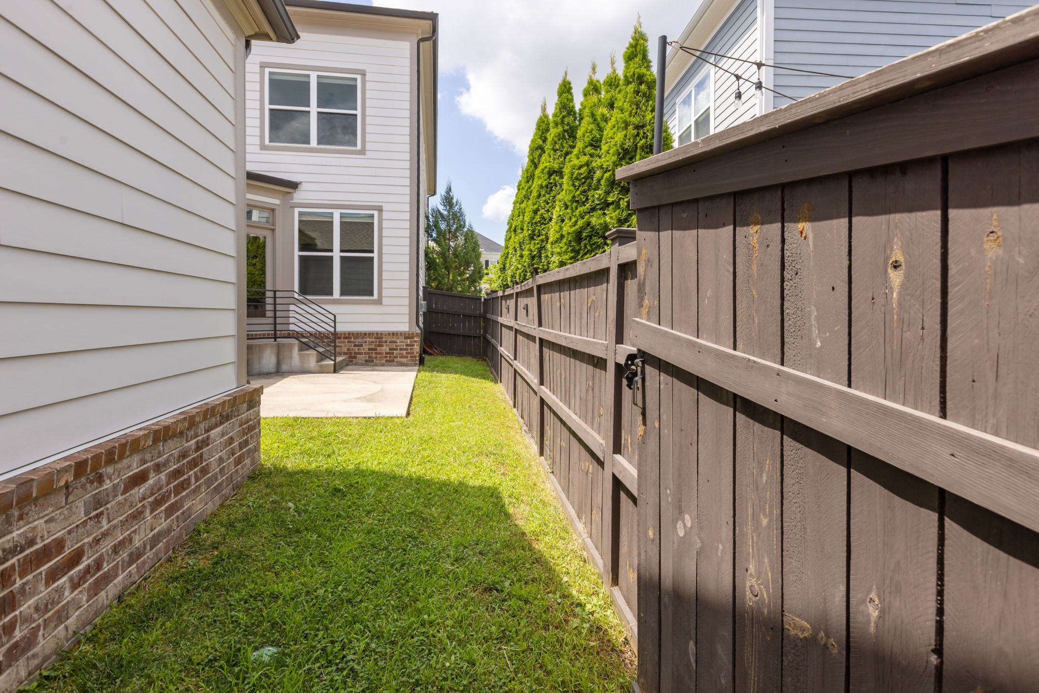 3091 Cheever Street Franklin, TN 37064 - Photo 35 of 36 a view of a house with backyard and wooden fence