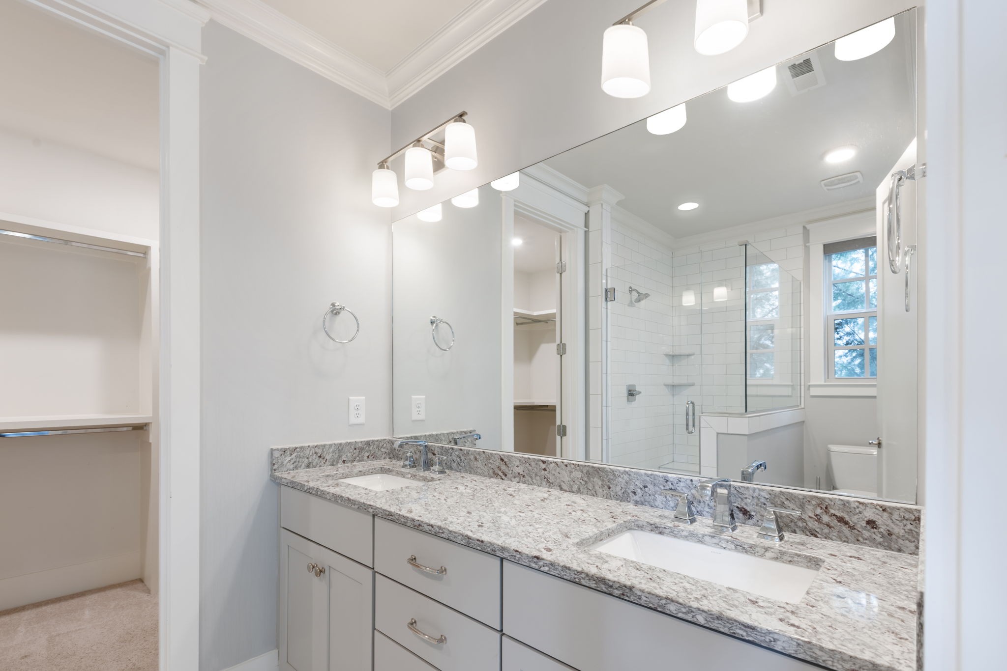 3091 Cheever Street Franklin, TN 37064 - Photo 10 of 36 a bathroom with a granite countertop double vanity sink and a mirror