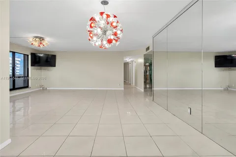 a view of an entryway with a chandelier